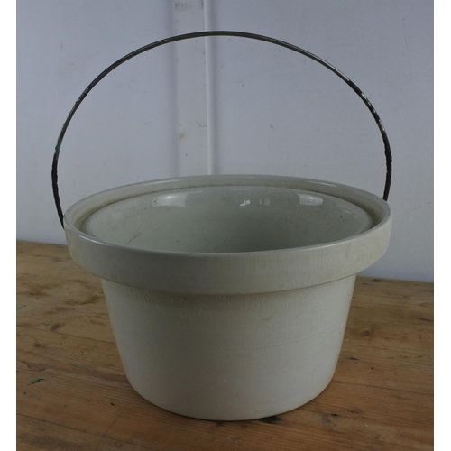213 - An antique ceramic pot.
