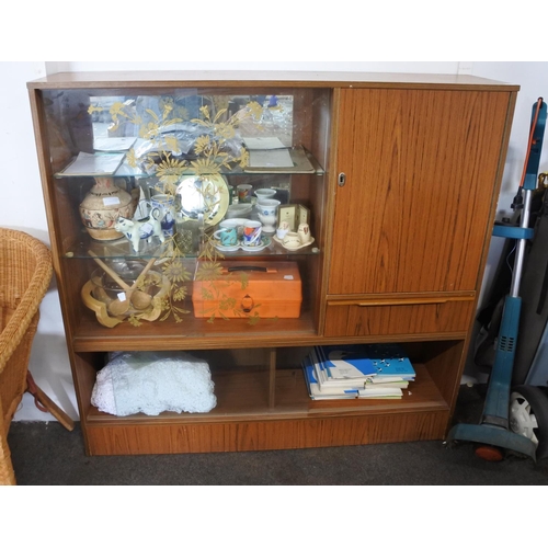 216 - A vintage slimline display cabinet with decorative glass doors. (lacking key)