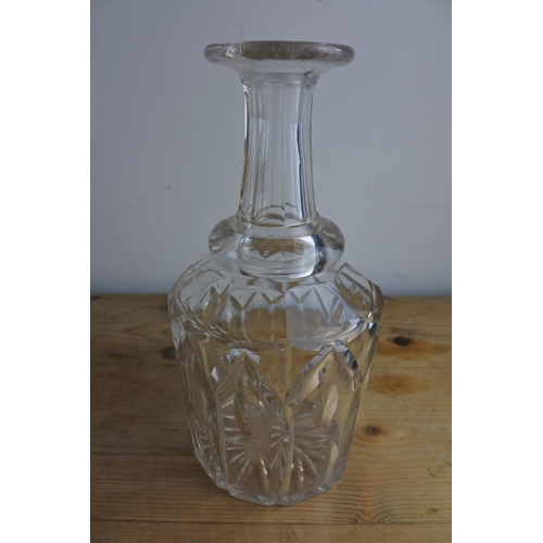 234 - Two early 19th century glass decanter, one ovoid with moulded ribbed sides, the other mallet shaped ... 