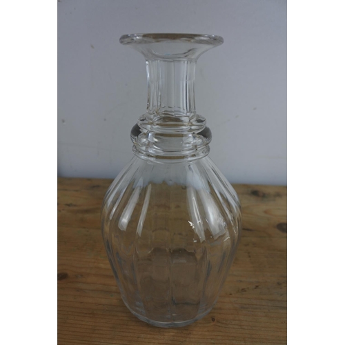 234 - Two early 19th century glass decanter, one ovoid with moulded ribbed sides, the other mallet shaped ... 