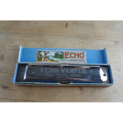241 - A Vintage Horner 'Echo Vamper' harmonica in the key of B in perfect tune and in original box.