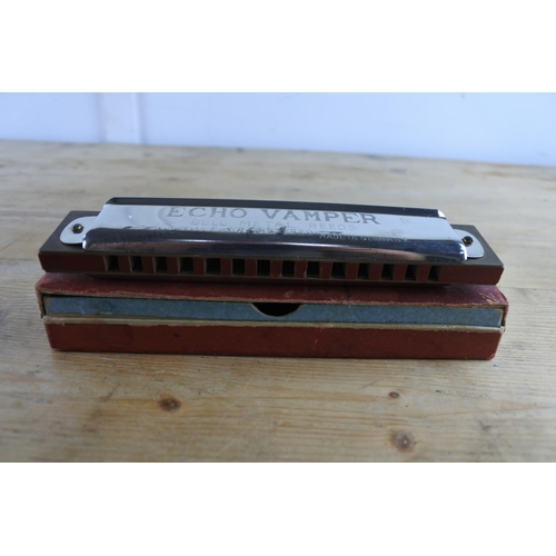 241 - A Vintage Horner 'Echo Vamper' harmonica in the key of B in perfect tune and in original box.