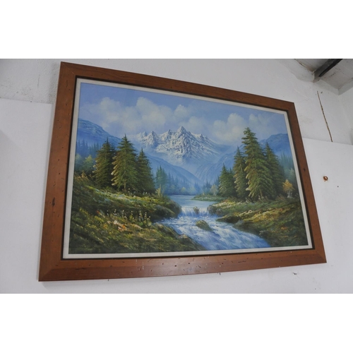 267 - A large framed print of a mountain scene.