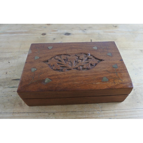 271 - A wooden and brass jewellery box and a collection of Royal British Legion badges.