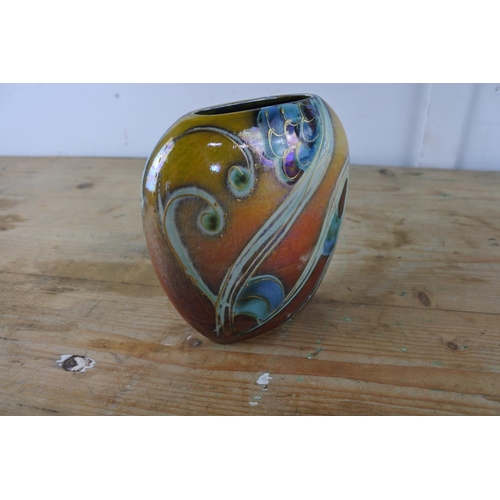 299 - A stunning hand painted decorative vessel, signed Anita Harris.