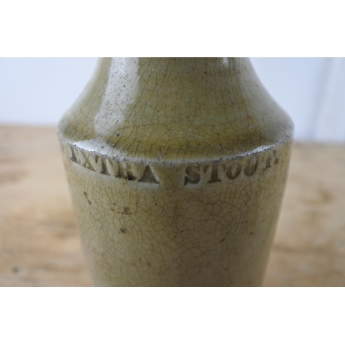 301 - A rare 'Dublin Extra Stout' stoneware beer bottle.