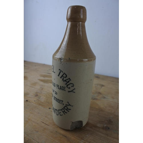 302 - A rare 'Michael Tracy, Londonderry' stoneware beer bottle.
