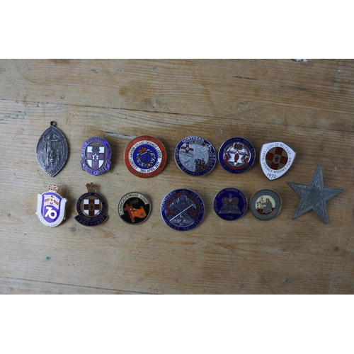 308 - A collection of various badges.