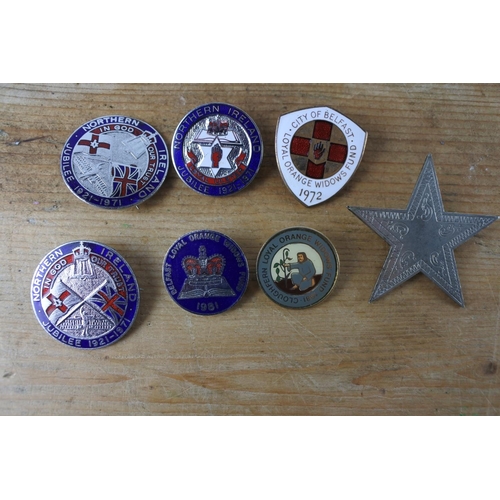 308 - A collection of various badges.