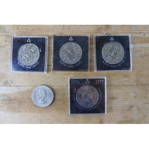 309 - Four cased 1952 - 1977 H.M. Queen Elizabeth II Silver Jubilee Crowns and another.