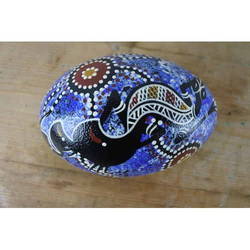 321 - A hand painted Ostrich egg.