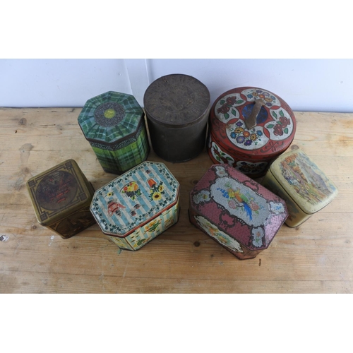 335 - A collection of vintage tins.
