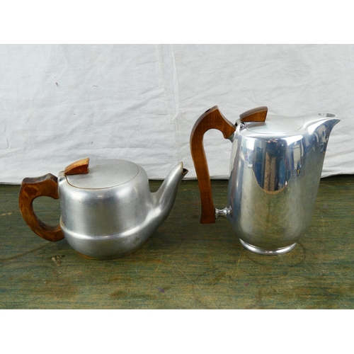 100 - A two piece Picquot ware tea and coffee pot.