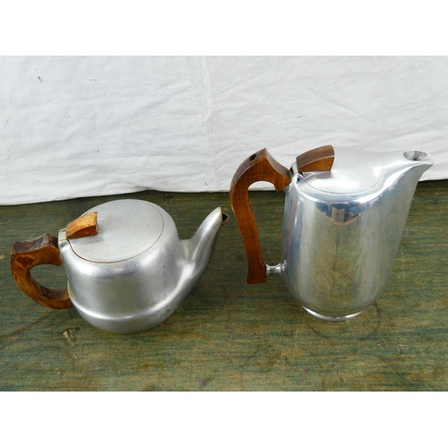 100 - A two piece Picquot ware tea and coffee pot.