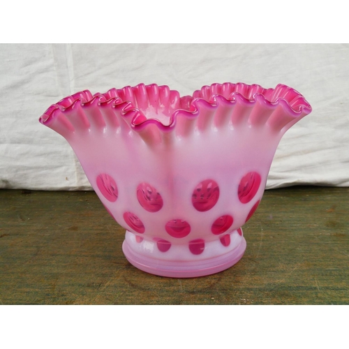 101 - A stunning antique pink glass bowl with white overlay pattern.