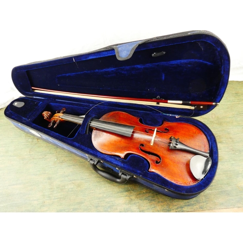 106 - A violin and case.