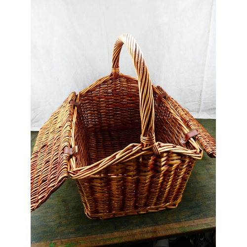 107 - A large wicker picnic basket.