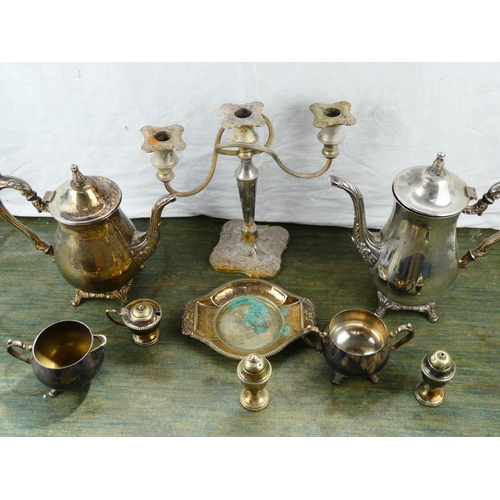 113 - A four piece silver plated tea service and more.