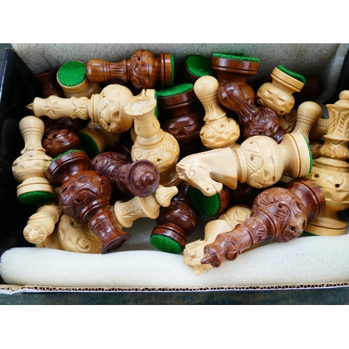 120 - A set of wooden chess pieces.