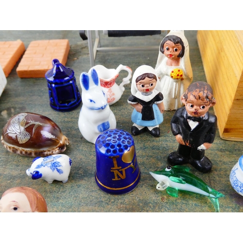 130 - A collection of assorted dolls house accessories, figures and more.