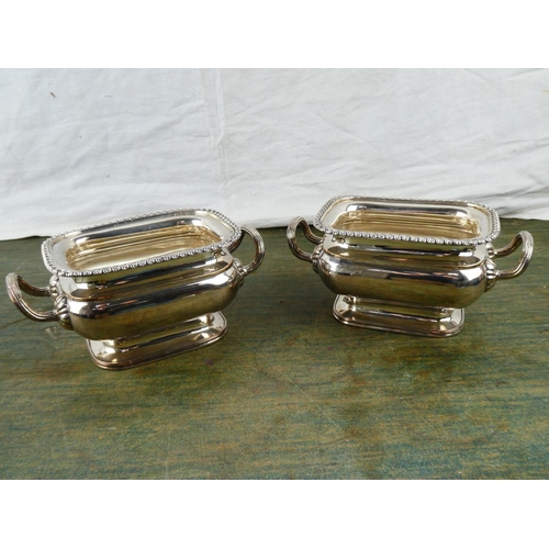 133 - A fine pair of Old Sheffield plate sauce tureens with reeded handles and gadrooned rims, English c18... 