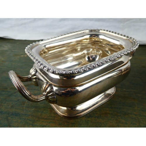 133 - A fine pair of Old Sheffield plate sauce tureens with reeded handles and gadrooned rims, English c18... 