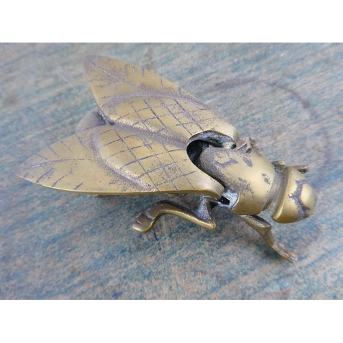136 - A brass 'fly' nutcracker.