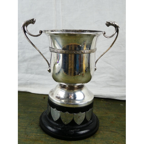 137 - A large silver plated N.I.A.A.A. presentation cup on plinth.