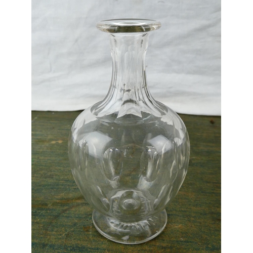 140 - A 19th century glass decanter with slice cut sloping shoulders, annulated neck ring and flat topped ... 