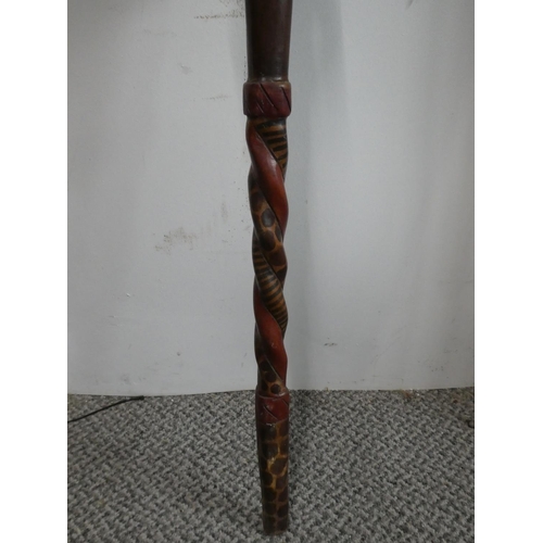 151 - An African carved walking stick.