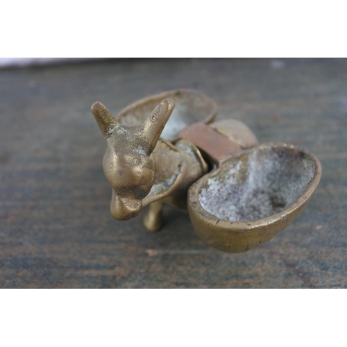 16 - A vintage novelty brass ashtray, modelled as a donkey.