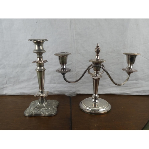 167 - A three branch silver plated candelabra and another candlestick.