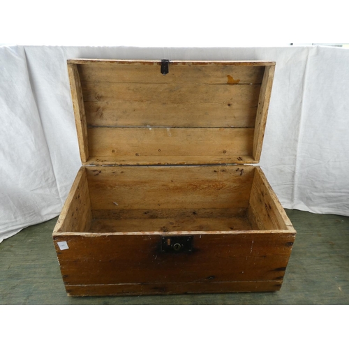 175 - An antique wooden dome topped storage chest.