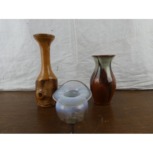 183 - A small antique vaseline glass vase, a terracotta vase and a wooden vase.