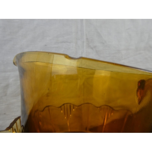 184 - A vintage amber glass fruit bowl and jug.