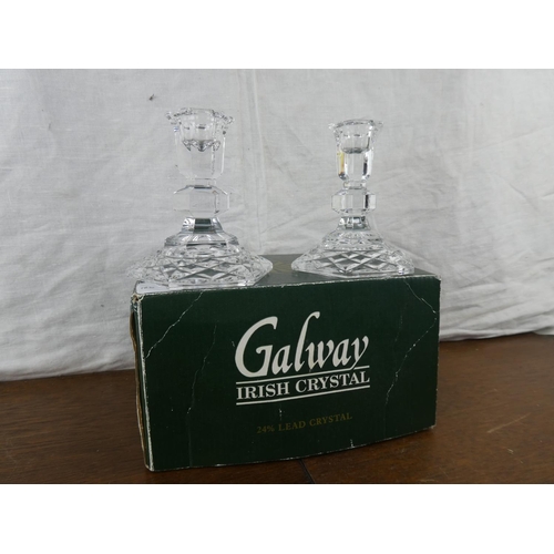 185 - A pair of boxed Galway crystal candlesticks.