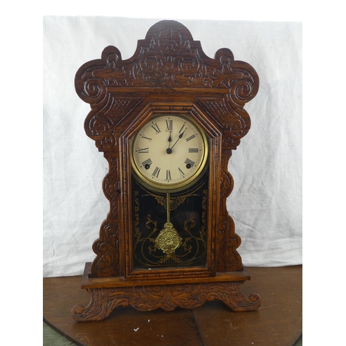 191 - An antique gingerbread clock.