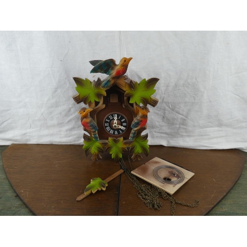 197 - A decorative cuckoo wall clock.