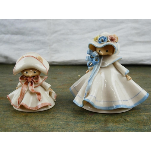 22 - Two handmade ceramic figures.