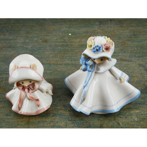 22 - Two handmade ceramic figures.