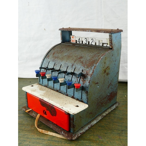 23 - A vintage Codec toy cash register. (a/f)