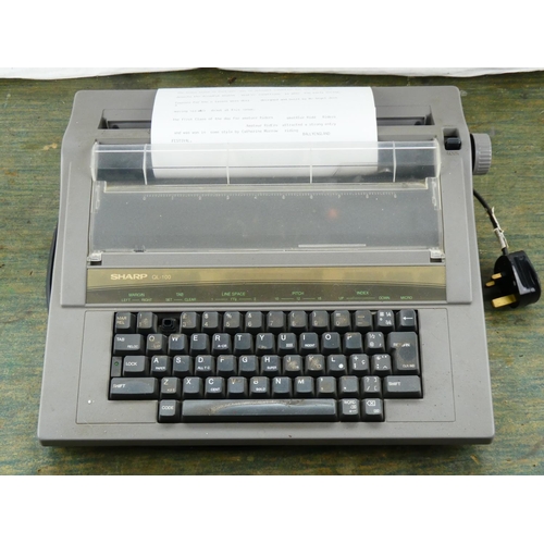 49 - A vintage Sharp QL 100 electric typewriter.