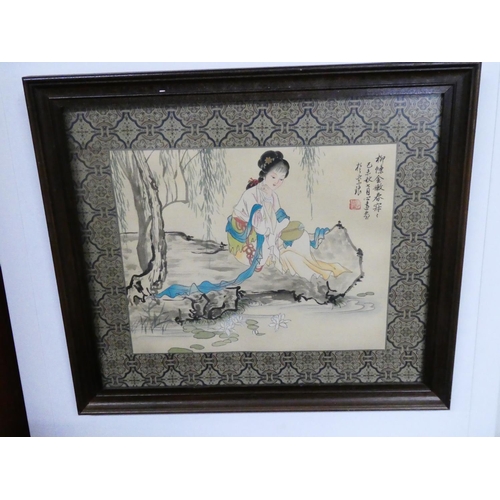 53 - A framed print of a Geisha girl.