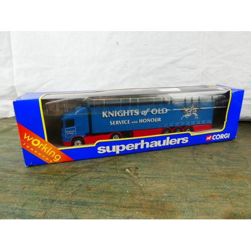 58 - A boxed Corgi Superhaulers TY86611 Scania Curtainsider -Knights of Old lorry.