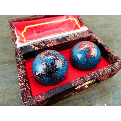 64 - A boxed set of Lotus Pond Chinese medicine balls.