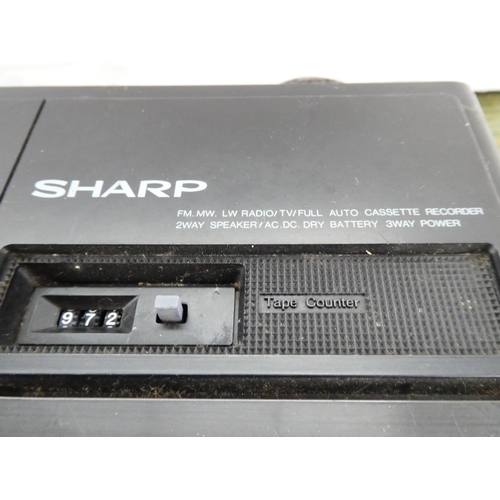 70 - A vintage Sharp radio cassette TV combo.