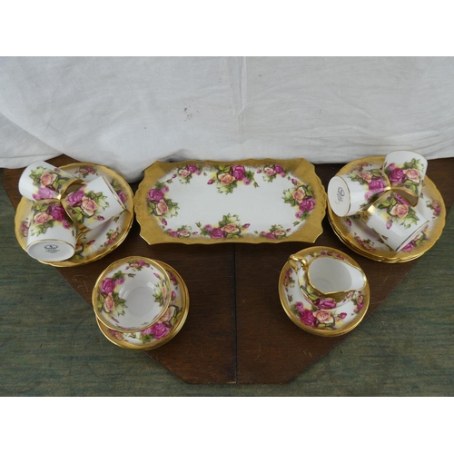 410 - A stunning antique/ vintage coffee set, 'Golden Rose' by Royal Chelsea, to include 6 cups, saucers, ... 