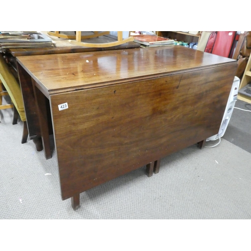 423 - A stunning antique drop leaf dining table.