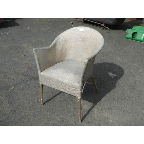 446 - A vintage Lloyd Loom style chair.