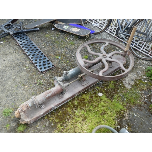 451 - A stunning antique well pump with manual hand cranked wheel.